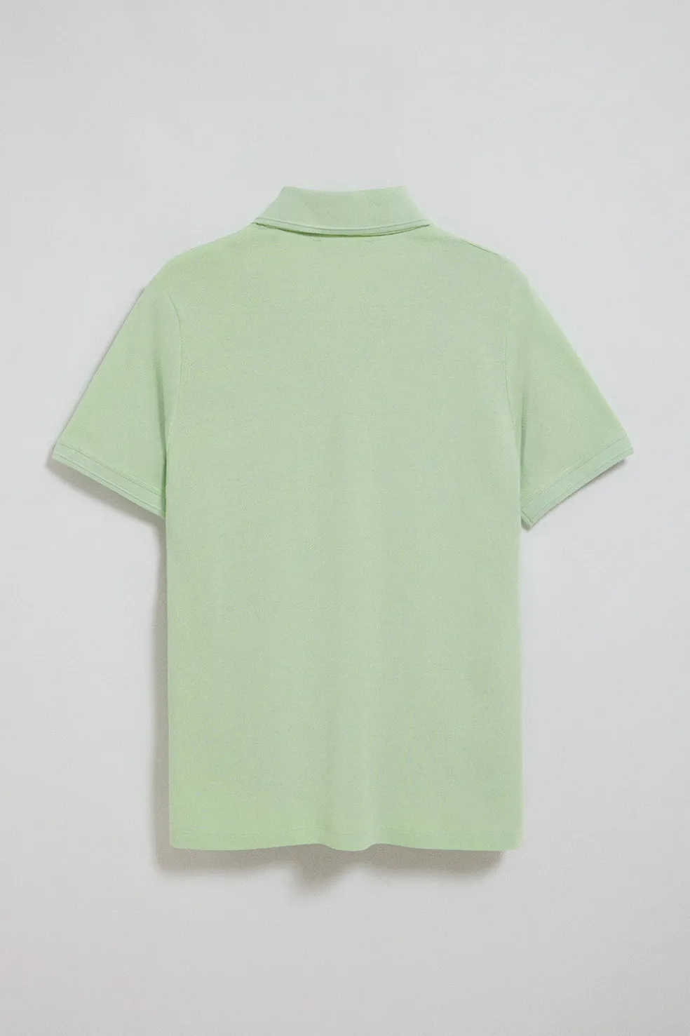 Polo color menta de manga corta y tres botones con logo bordado Rigby Go
