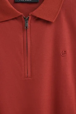 Polo color rojizo Esko con cremallera y monograma bordado