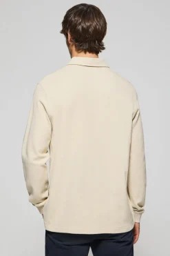 Polo de manga larga beige con dos botones y logo Rigby Go