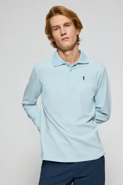 Polo de manga larga de tres botones en azul claro con logo Rigby Go
