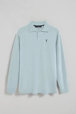 Polo de manga larga de tres botones en azul claro con logo Rigby Go