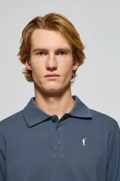 Polo de manga larga de tres botones en azul denim con logo Rigby Go