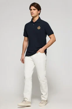 Polo Nautic azul marino con detalle de parche naútico en el pecho