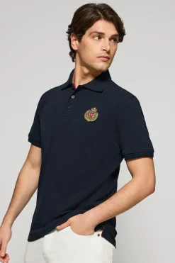 Polo Nautic azul marino con detalle de parche naútico en el pecho