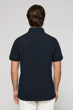 Polo Nautic azul marino con detalle de parche naútico en el pecho