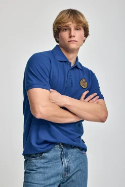 Polo Nautic azul royal con detalle de parche naútico en el pecho