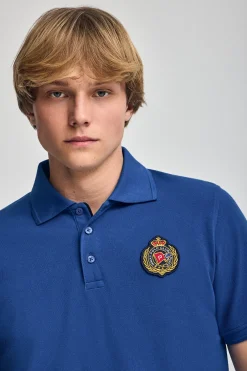 Polo Nautic azul royal con detalle de parche naútico en el pecho