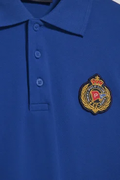 Polo Nautic azul royal con detalle de parche naútico en el pecho