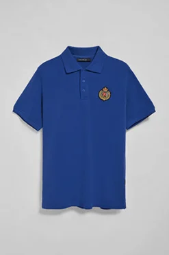 Polo Nautic azul royal con detalle de parche naútico en el pecho