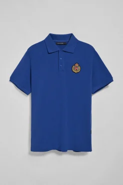 Polo Nautic azul royal con detalle de parche naútico en el pecho