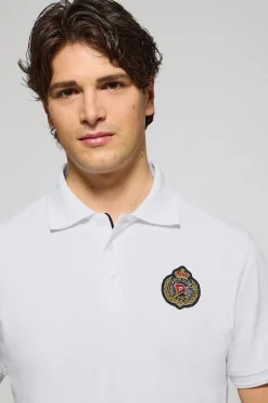 Polo Nautic blanco con detalle de parche naútico en el pecho