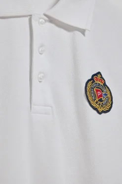 Polo Nautic blanco con detalle de parche naútico en el pecho