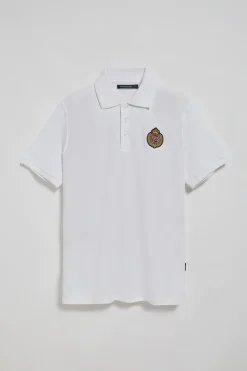 Polo Nautic blanco con detalle de parche naútico en el pecho
