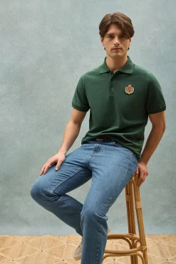 Polo Nautic verde con detalle de parche naútico en el pecho