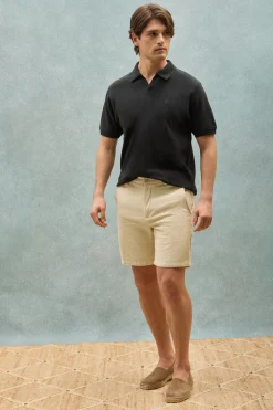 Polo negro Pascal sin botones con monograma bordado