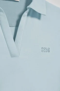 Polo Pedraza sin botones azul claro con logo engomado Polo Club