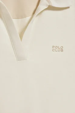 Polo Pedraza sin botones color crudo con logo engomado Polo Club