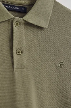 Polo verde claro de algodón y lino con dos botones y monograma bordado
