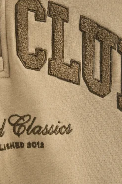 Sudadera marron claro con cuello alto y logo Established 2012 Polo Club