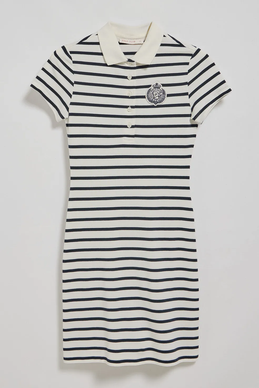 Vestido color crudo de rayas y cuello de polo con parche náutico