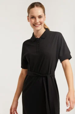 Vestido negro con manga dolman y bordado al tono